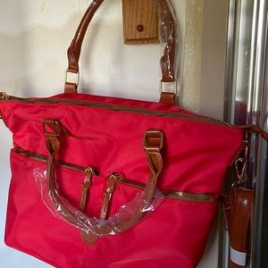 Red nylon bag with shoulder strap